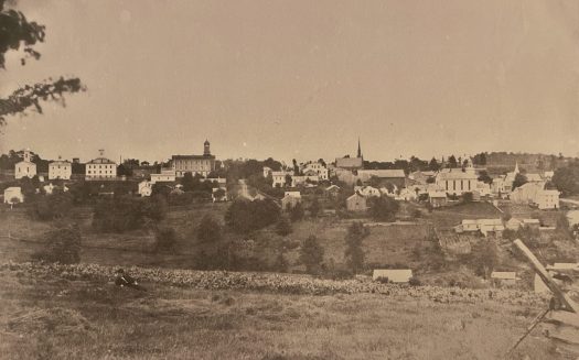 Panormic view of Montrose, Pennsylvania, including the first and second county courthouses